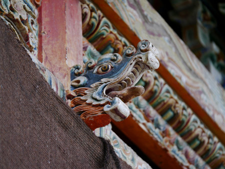 A carved dragon stands guard at this Dayun temple, presumably for a century or more.のeditorial素材