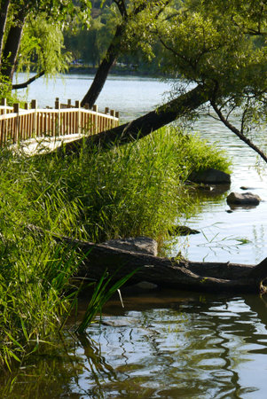 Exploring the perimeter of the Summer Mountain Palace via the water's edge.の写真素材