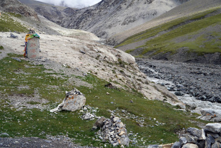 Buddhist faithful come to pray and leave offerings on Qilian Mountain.の写真素材