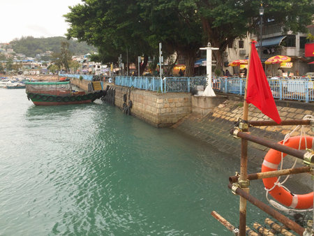 Cheung Chau, or "Long Island" in Cantonese, is an hour ride on the ferry from Central Hong Kong. It's a village packed with both old world charm, and 21st century entrepreneurship.の写真素材