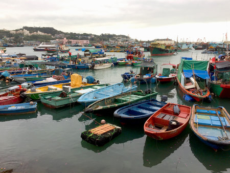 Cheung Chau, or 'Long Island' in Cantonese, is an hour ride on the ferry from Central Hong Kong. It's a village packed with both old world charm, and 21st century entrepreneurship.の写真素材