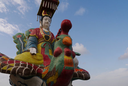 If I wasn't a chicken-riding sea empress in my last life, perhaps I will be in my next. This is one of many colorful tile statues near the Tin Hau temple at Repulse Bay Beach.のeditorial素材