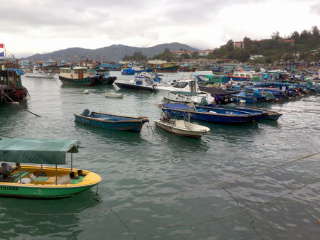 Cheung Chau, or "Long Island" in Cantonese, is an hour ride on the ferry from Central Hong Kong. It's a village packed with both old world charm, and 21st century entrepreneurship.の写真素材
