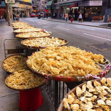 A local food market drying fish and vegetables. Hong Kong, 2018の写真素材