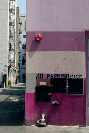 Los Angeles downtown alley celebrating a No Parking Zone with shades of pink.のeditorial素材