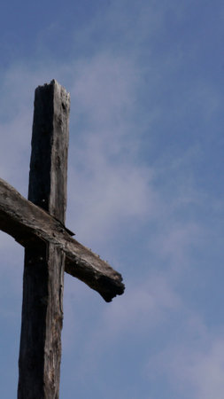 Serra Cross was damaged in the Thomas Fire of 2017. The Park has been fully rehabilitated; the cross, which remained standing, was left to tell the story. Blue sky background. Ventura, CAの写真素材