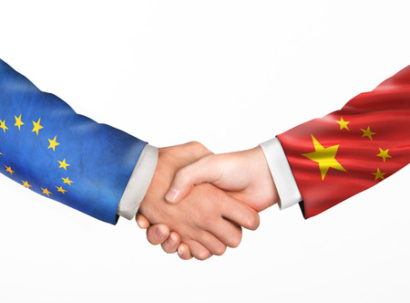 Man shake hands. Friendship countries. Flags of countrieshake hands. Friendship countries. Flags of countriesの写真素材