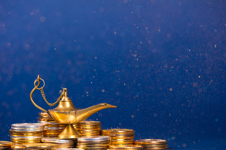 Magic lamp of wishes with smoke coming out from the lampの写真素材