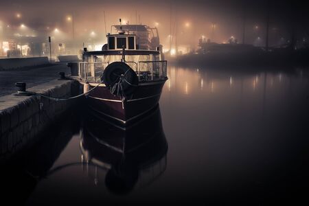Docked boat in the fog, in Malaga, Spain  Sepia の写真素材