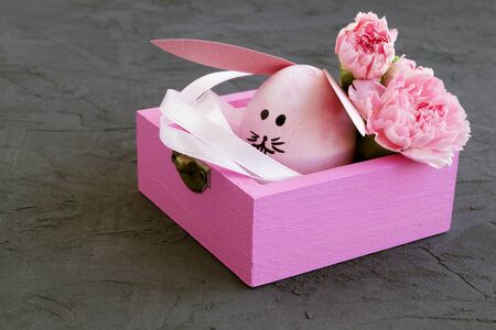 Easter colored eggs on the grey background.の写真素材