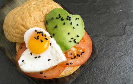 Breakfast on Valentine's day. sandwich with egg and avocado.
の写真素材