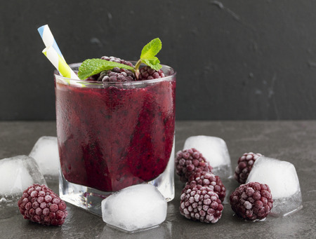 Smoothie of blackberries and currants. on dark background.の写真素材