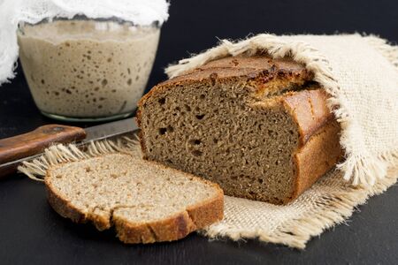 Homemade rye bread sliced. on black background.
の写真素材