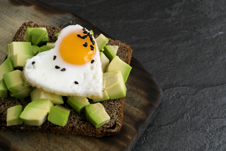 Breakfast on Valentine's day. sandwich with egg and avocado.
の写真素材
