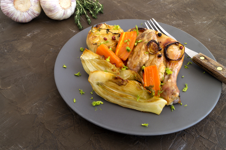 Fried chicken with vegetables. on a gray plate.
の写真素材