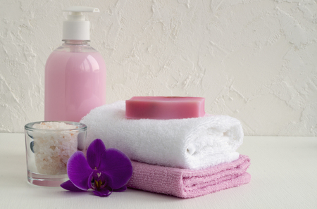 Liquid soap and two towels on a white background.
の写真素材