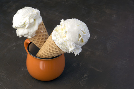 A scoop of ice cream in a crispy waffle cone.
の写真素材