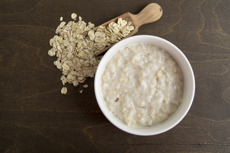 Healthy Breakfast. Oatmeal in a white bowlの写真素材