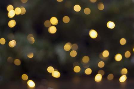 Yellow bokeh holiday. Abstract Christmas holiday backgroundの写真素材