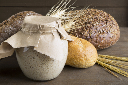 Active rye sourdough in a glass jar for homemade bread.の写真素材