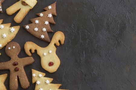 Homemade children's Christmas cookies of various shapes