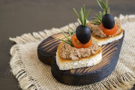 fried bread with meat pate in the shape of a heart.の写真素材