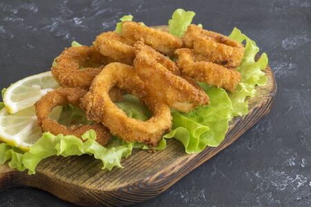 squid rings deep fried with crispy crust.