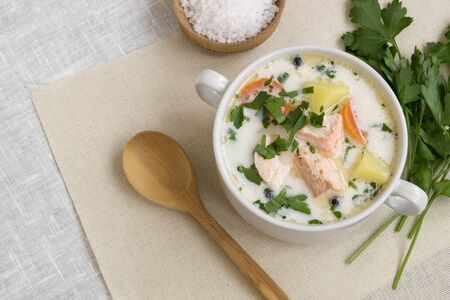 traditional salmon soup with vegetables and cream.の写真素材