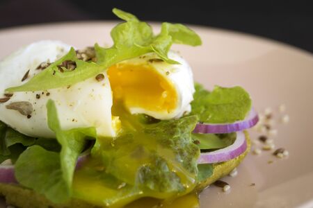 poached egg on healthy bread with avocado. healthy breakfast
の写真素材