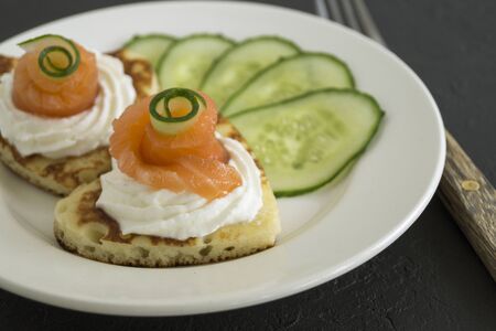 heart-shaped pancakes for Valentine's day. with cream and smoked salmon.