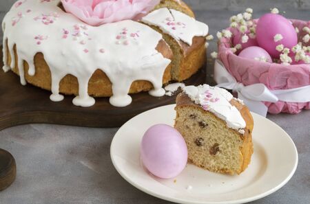 Easter food. Easter cakes and painted eggs. in pink tones.