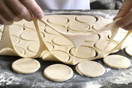 dough rolled out for cooking dumplings. modeling of dumplings.の写真素材