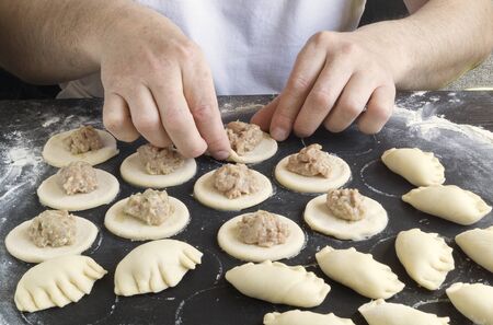 dough rolled out for cooking dumplings. modeling of dumplings.の写真素材