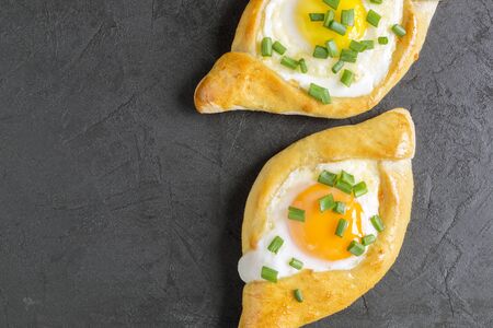 Ajarian khachapuri with egg. traditional Caucasian dish.の写真素材