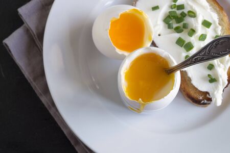 soft-boiled egg. delicious healthy Breakfast. in the egg rackの写真素材