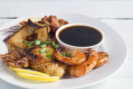 spicy fried seafood in sauce. asian cuisineの写真素材