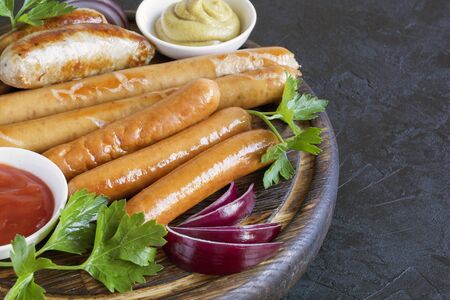 assorted savory fried sausages. on dark backgroundの写真素材