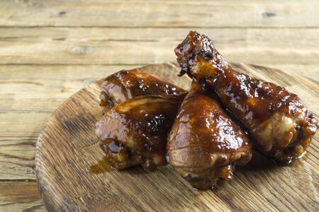chicken legs fried in a sweet and spicy sauce. glazed shanksの写真素材