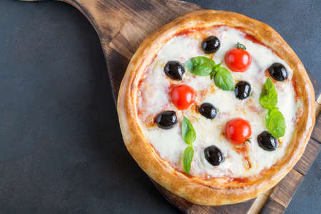 Traditional Italian dish, delicious pizza Margarita.の写真素材