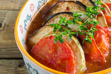 Ratatouille. traditional French vegetable stew. on a wooden table.の写真素材