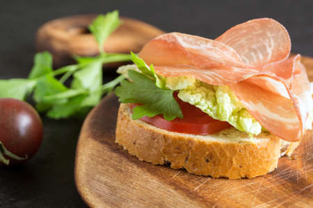 ham sandwich. Open sandwich with ham slices on whole grain bread.の写真素材
