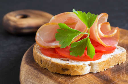 ham sandwich. Open sandwich with ham slices on whole grain bread.の写真素材