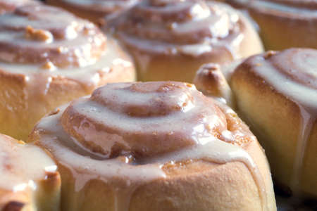 homemade rolls with Cinnabon cinnamon. drizzled with cream cheese sauceの写真素材