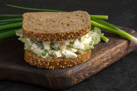 sandwich with egg salad on wholegrain bread. close up