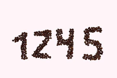numbers one two four five lined with coffeeの写真素材