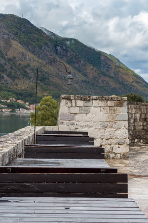 small lantern in the castle on the table mountains in the backgroundの写真素材