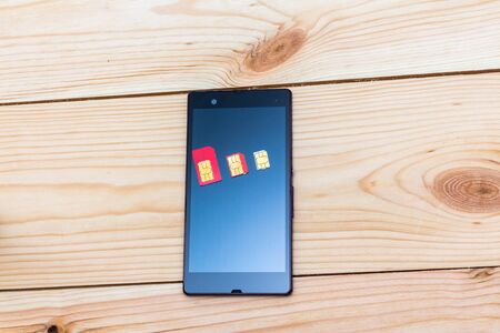 SIM cards of different form factor (standard, micro, nano) smartphone
