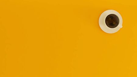 isolated Coffee cup over yellow background realistic 3D renderingの写真素材