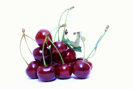 On this photo is sour cherry with isolated background.の写真素材