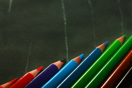 Photo of crayons on black backdropの写真素材